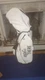 White golf bag manufactured by Vessel, featuring premium tour-grade leather.
